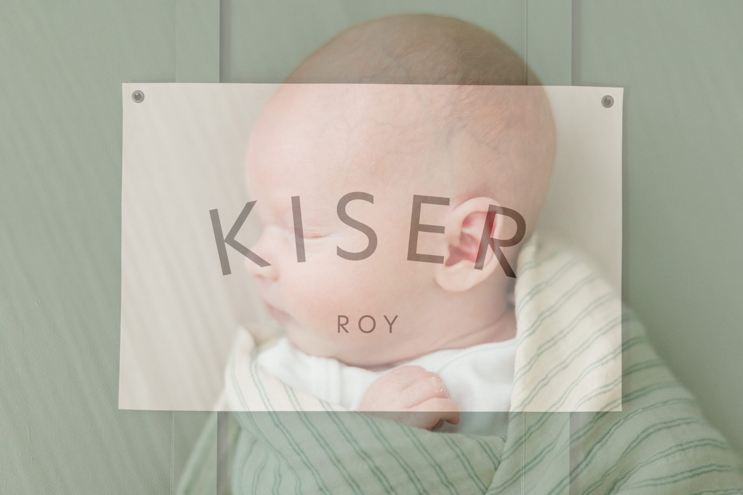 Double Exposure of newborn baby and name sign in his room in post about DIY newborn photography