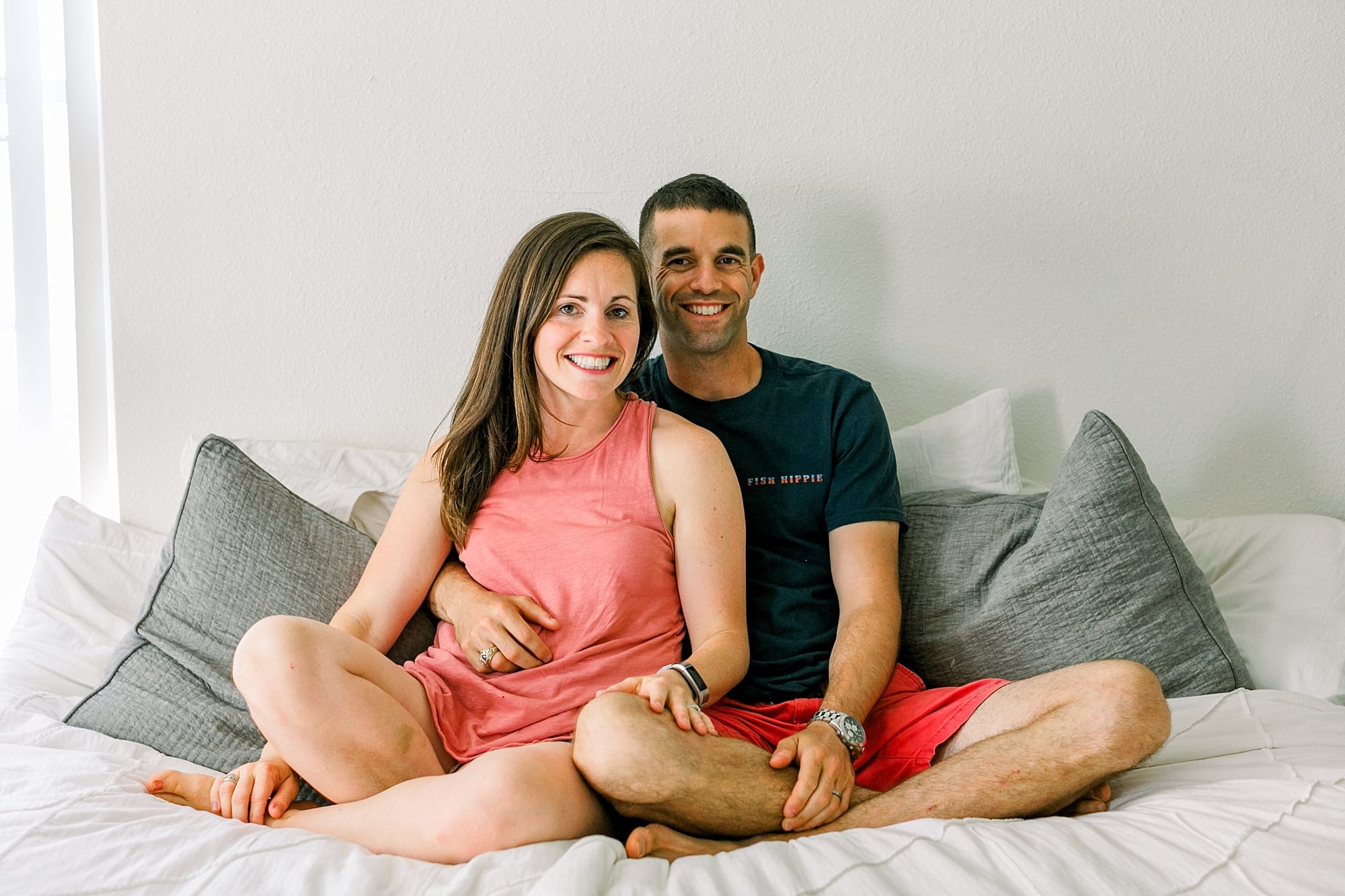 Miami couple posing for family photos at home